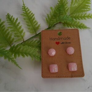 Two pack light pink glitter resin stud earrings